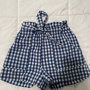 Adorable woman’s plaid high rise shorts